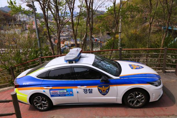 Seoul, Republic of Korea - October 27, 2015: Tourist assistance police minivan parked in front of police station.