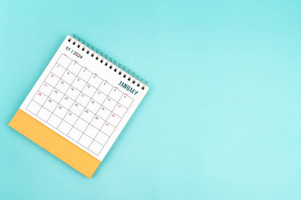 istock 2024 January Desk Calendar On Blue Background. 1835045031