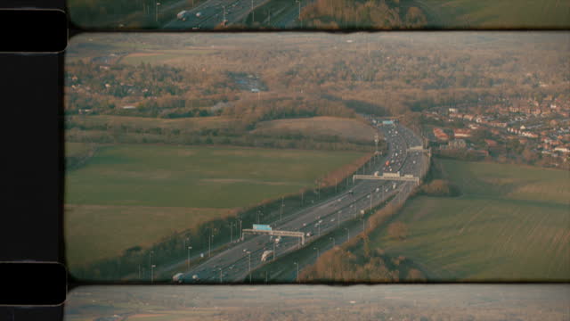Old Film Aerial View of a Busy Motorway, UK at Rush Hour. 4KOld Film