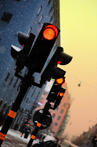 istock Red light against twilight, Snow in the air 183505977
