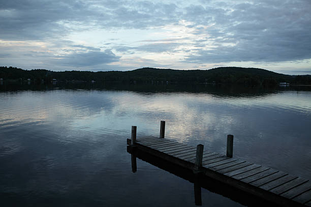 View of the evening sky and Milky Way on a clear summer night from Lake Titus, located near Malone, New York up near the Canadian border.