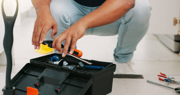 istock Repair, maintenance and man with box of tools for home construction, fixing and kitchen plumbing. Manual labor, DIY plumber and handyman pack equipment after working on sewer pipe, sink and faucet 1835101728