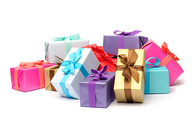 Multicolored and beribboned gift boxes in pile "Colourful gifts, isolated on pure white. No sharpening." medium group of objects stock pictures, royalty-free photos & images