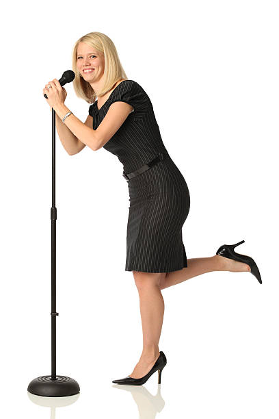 istock Woman singing into microphone 183511160