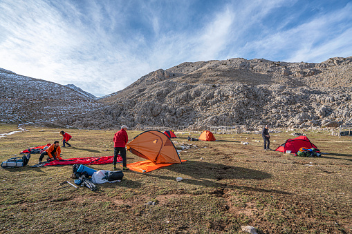 Gömbe Akdağ, Antalya, Turkey- December 03, 2023: mountaineers are preparing their camp at subaşı plateau, Antalya