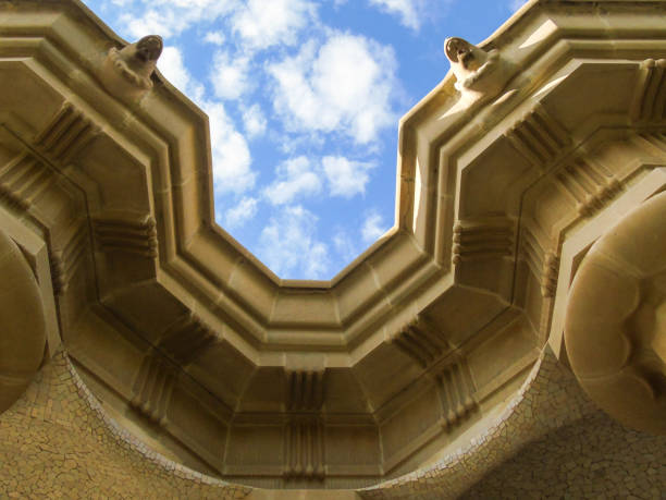 Low angle of the columns that support the guell park terrace. Barcelona - Spain