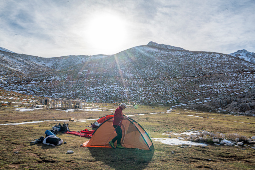 Gömbe Akdağ, Antalya, Turkey- December 03, 2023: mountaineers are preparing their camp at subaşı plateau, Antalya
