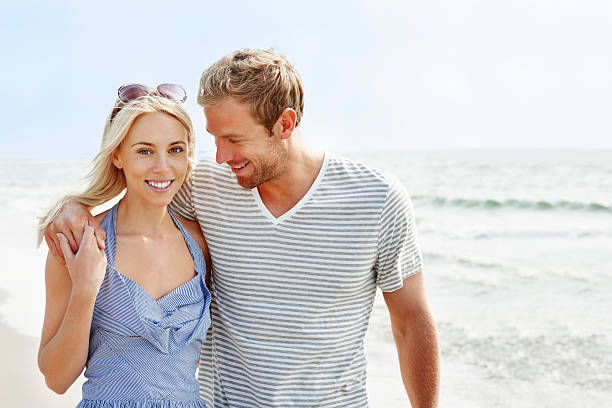 istock Romantic, young couple spending time at the beach 183512700
