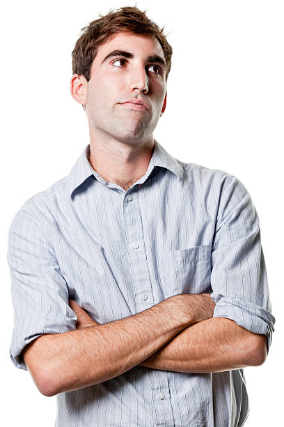 istock Young Man Crosses Arms and Looks Away 183514510