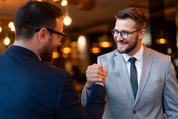 istock Two colleagues, acknowledging each other after a successful project 1835148576
