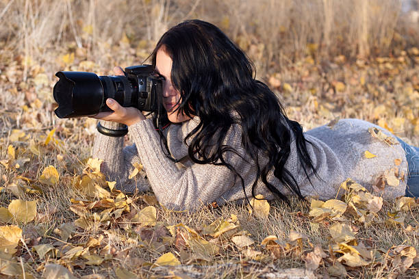 istock Female Nature Photographer Outdoors in Action 183515171