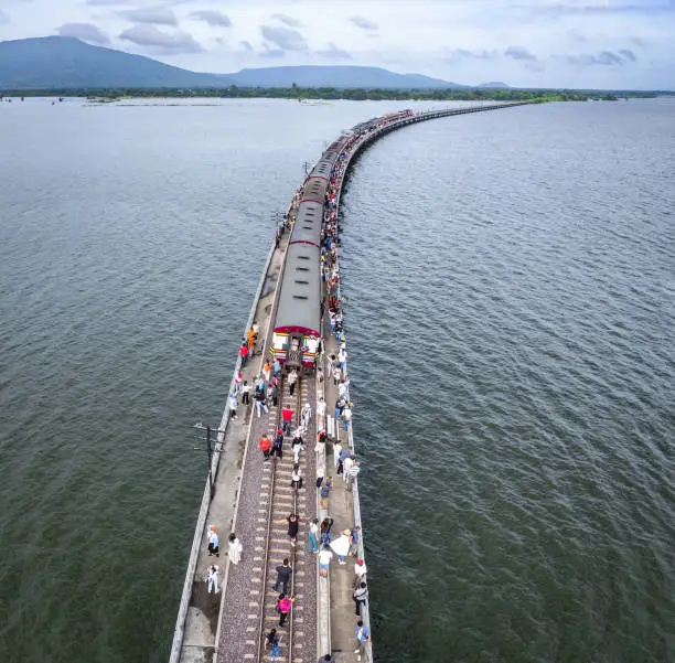 Photo of Aerial view of the floating train in Pasak Chonlasit Dam, Lopburi, Thailand