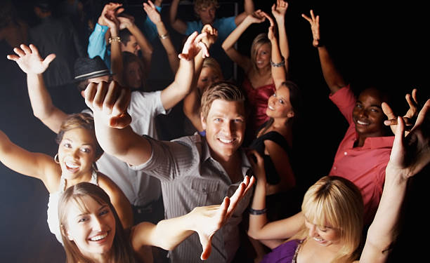 istock Party time - People dancing energetically in a nightclub 183516448