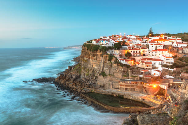 Azenhas do Mar, Portugal Azenhas do Mar, Portugal coastal town at dawn. azenhas do mar stock pictures, royalty-free photos & images