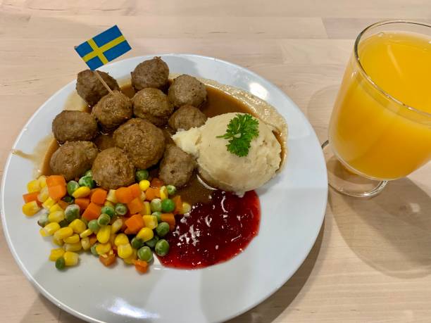 istock Swedish meatball dish with orange juice 1835179618