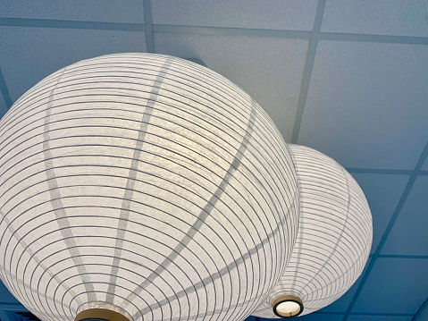 Ceiling mounted light fixture with white walls