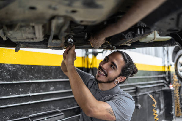 istock man servicing car in mechanic's shop 1835182916