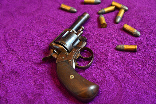 Old retro style revolver and ammunition; British Bulldog