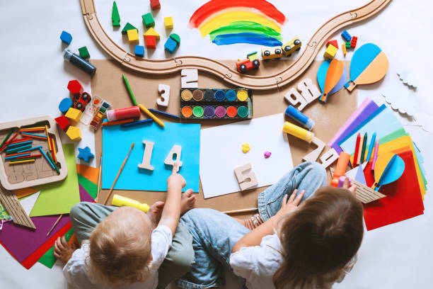 istock Children drawing and making crafts in kindergarten or daycare. 1835188468