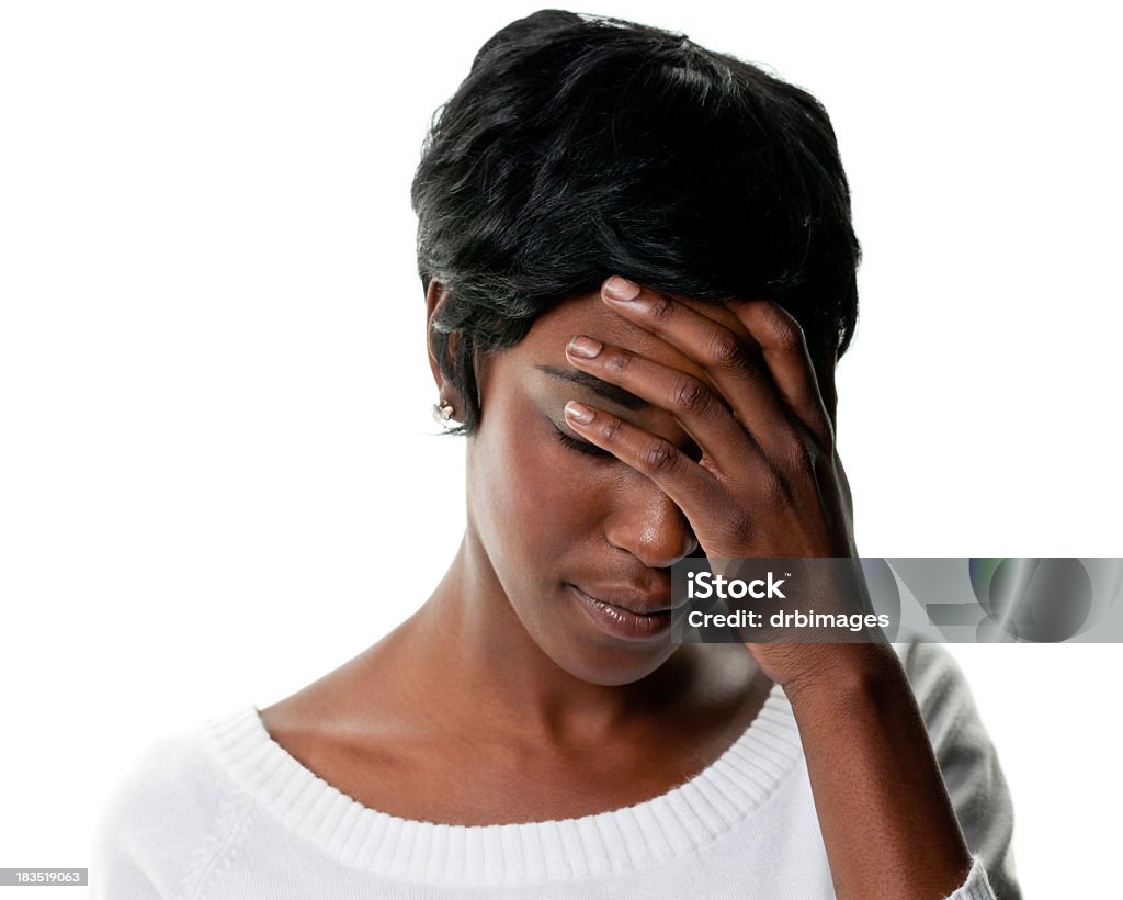 Sad Young Woman Looks Down And Covers Eyes Portrait of a young woman on a white background. http://s3.amazonaws.com/drbimages/m/jamban.jpg Women Stock Photo