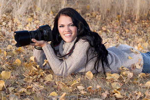 Female Nature Photographer Outdoors in Action