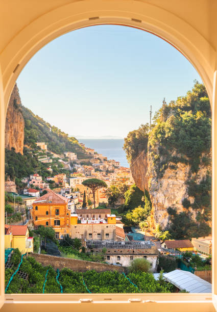 Amalfi, Italy on the Mediterranean coast through a window.