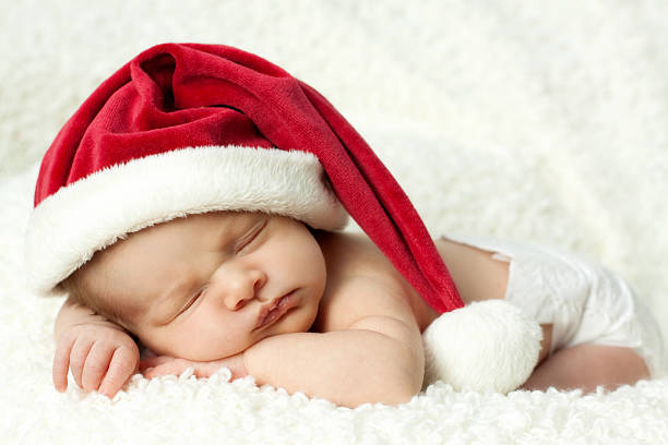 Newborn baby with Santa Hat stock photo