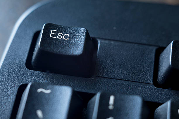 Escape computer key Escape computer key escape key escape computer push button stock pictures, royalty-free photos & images