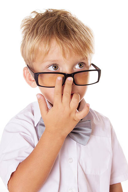 istock Boy adjusting glasses on nose 183522179
