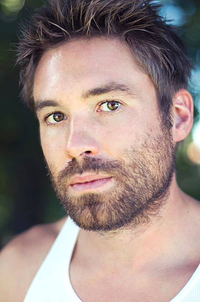 istock Handsome serious man in sleeveless t-shirt 183522878