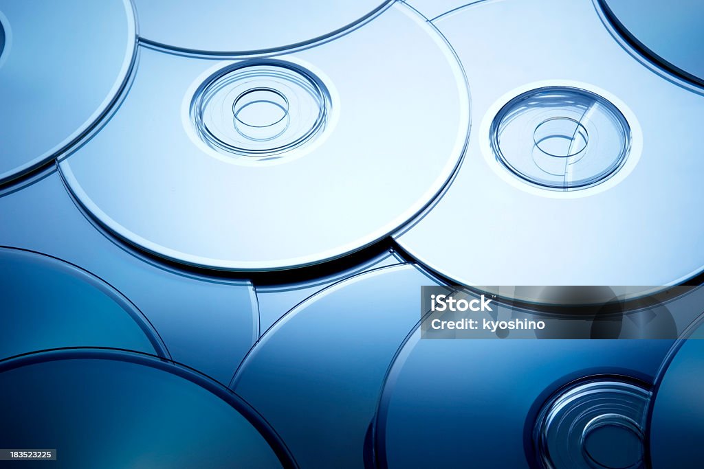 青色着色画像の空の CD /DVD のテクスチャ背景 - CD-ROMのロイヤリティフリーストックフォト
