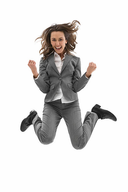 istock Young business woman jump 183524360