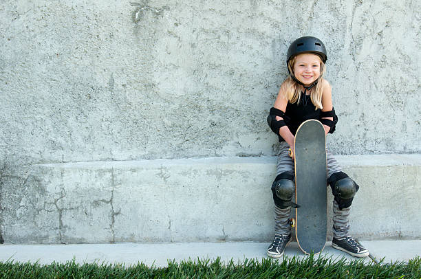 Feliz Menina de Skate - fotografia de stock