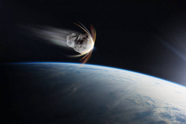 istock Earth planet and asteroid in outer space. Meteorite in outer space near Earth planet. Elements of this image furnished by NASA. 1835248241