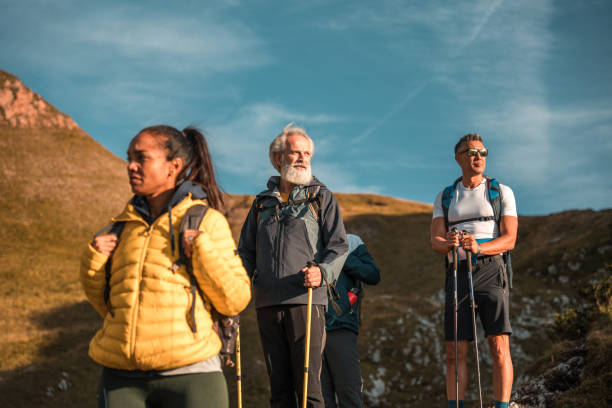 istock Diverse Group Having Fun Trekking Mangart Saddle on a Sunny Day 1835249830