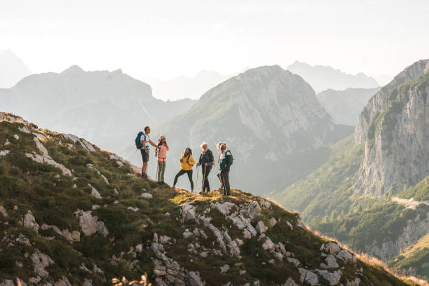 istock Diverse Friends Trekking Mountain Ridge with Backpacks 1835249837