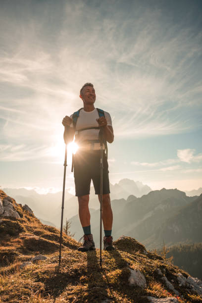 istock Mature Asian Man Hiking with Poles 1835250387