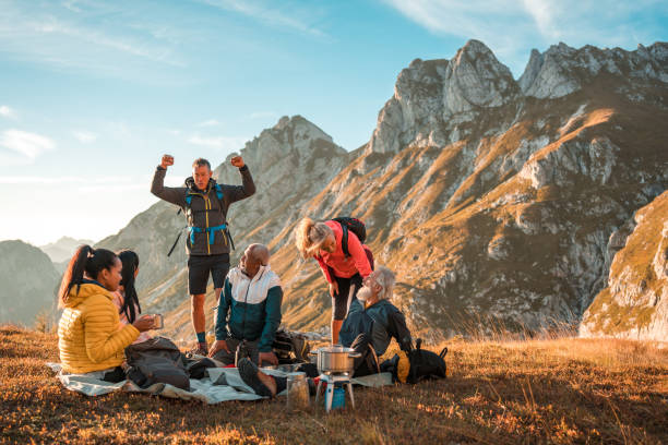 istock Hilltop Tea Pause with Diverse Hiking Friends 1835252548
