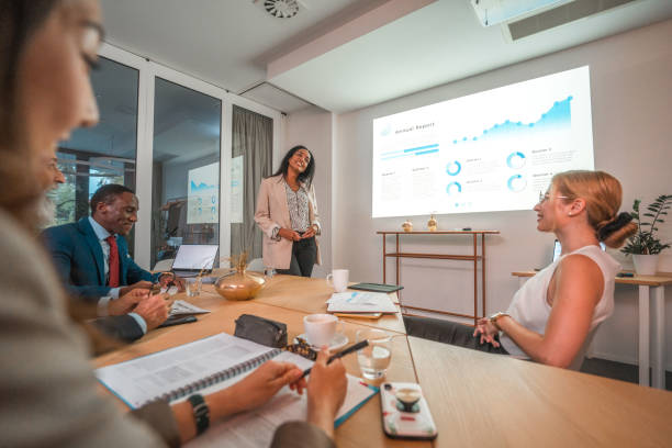 istock Multi-Ethnic Employees Discussing Market Trends 1835255863
