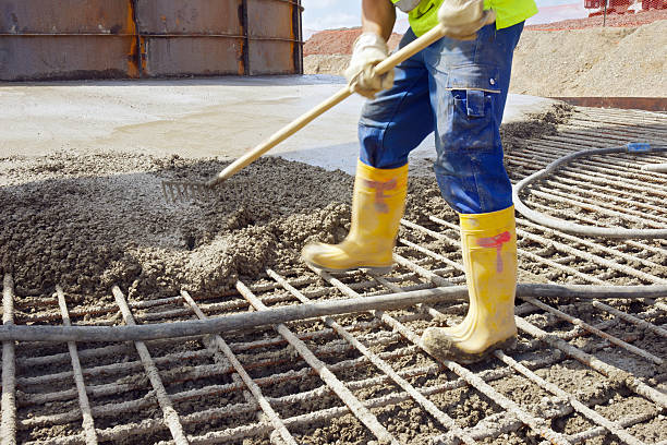 istock Finishing a large wind turbine concrete foundation 183526096