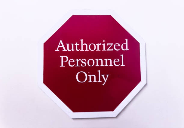 istock Authorized personnel sign against industrial backdrop, emphasizing restricted access and safety protocols 1835262855