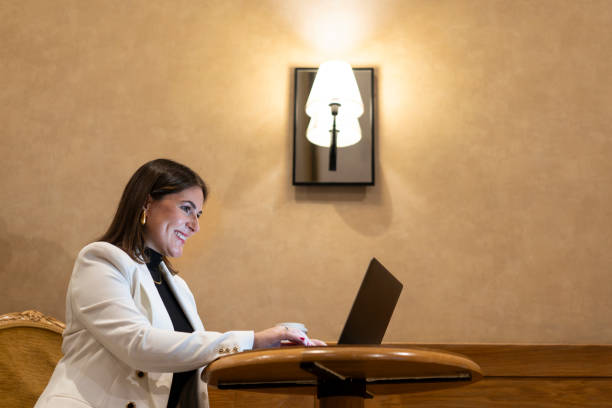 istock Businesswoman using laptop indoors 1835268788