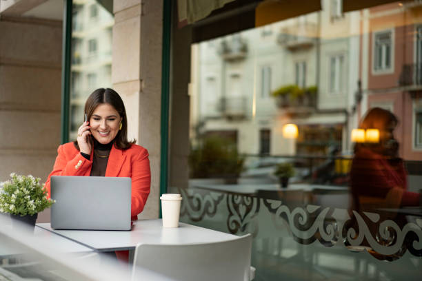 istock Woman connected to technological devices outdoors 1835271611
