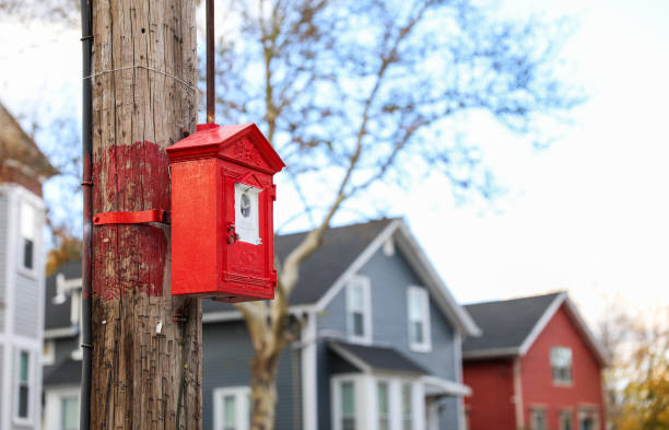 istock red fire alarm on a white wall, symbolizing safety and emergency preparedness 1835278074