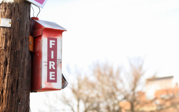 istock red fire alarm on a white wall, symbolizing safety and emergency preparedness 1835278076