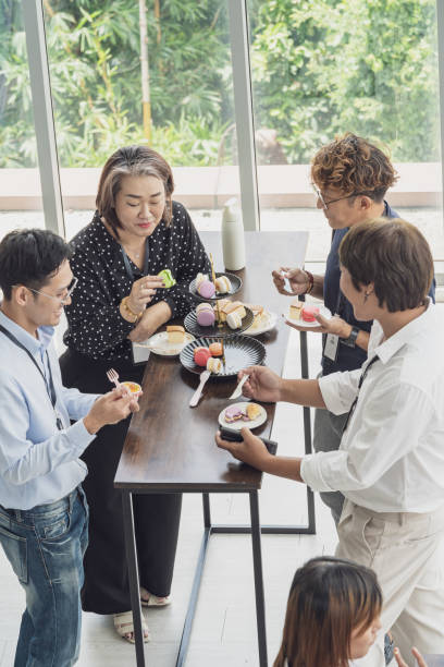 istock Business People Having a snack and dessert during the break 1835292699