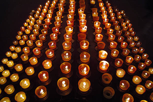 istock burning candles in church 183529641