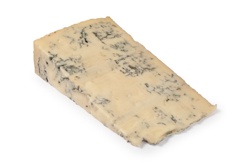 Studio shot of a slice of gorgonzola cheese cut out against a white background