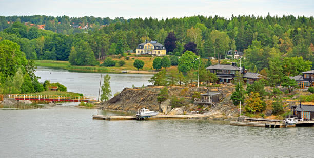 istock Stockholm archipelago, largest archipelago in Sweden, and second-largest archipelago in Baltic Sea. Summer landscape with luxury houses 1835331124