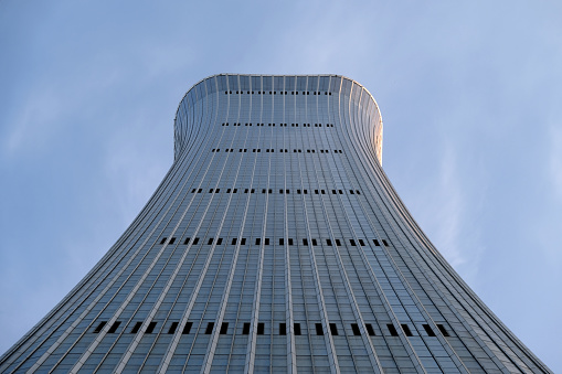 Low angle view of CITIC Tower (otherwise known as China Zun) a supertall skyscraper in the Central Business District of Beijing, China. It is 528 m tall, the tallest in Beijing.